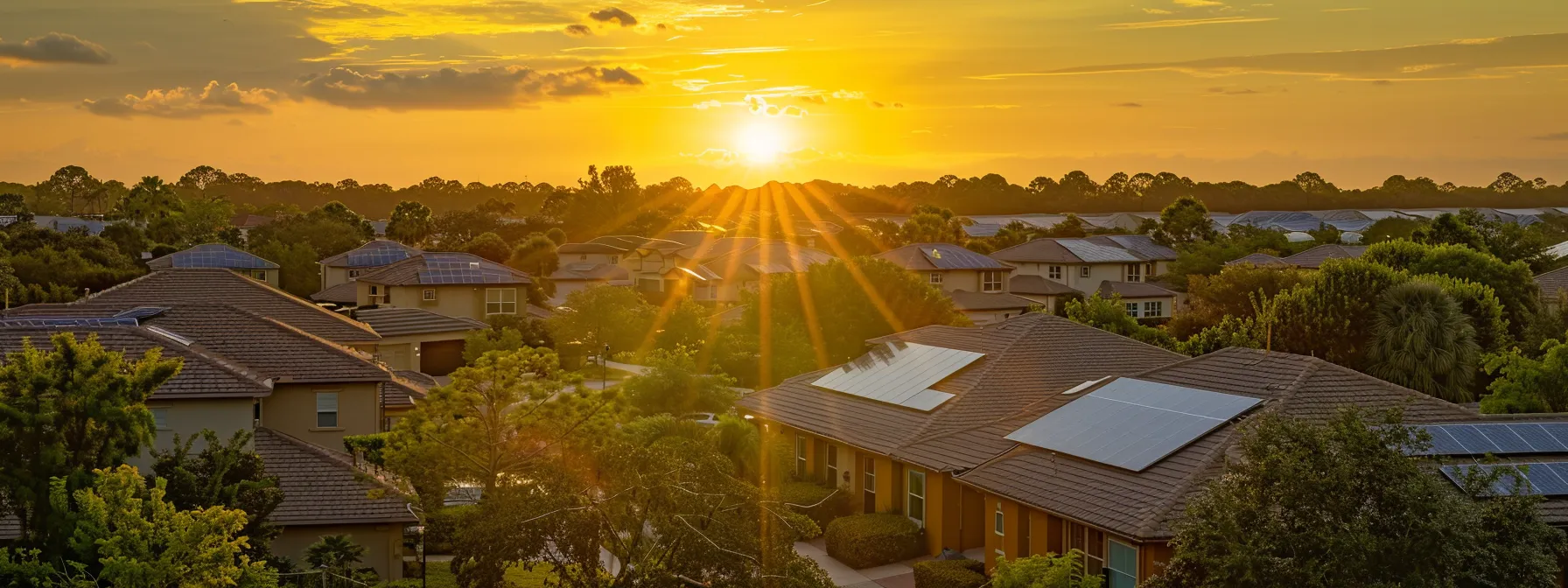 a vibrant sunrise casts golden light over a modern orlando neighborhood, showcasing gleaming solar panels on rooftops surrounded by lush greenery, symbolizing the transition to sustainable energy. a vibrant sunrise casts golden light over a modern orlando neighborhood, showcasing gleaming solar panels on rooftops surrounded by lush greenery, symbolizing the transition to sustainable energy.